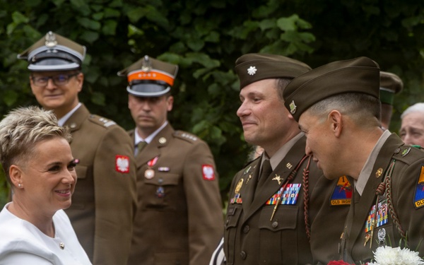 U.S. Army Soldiers participate at a memorial ceremony in Poland