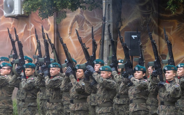 U.S. Army Soldiers participate at a memorial ceremony in Poland