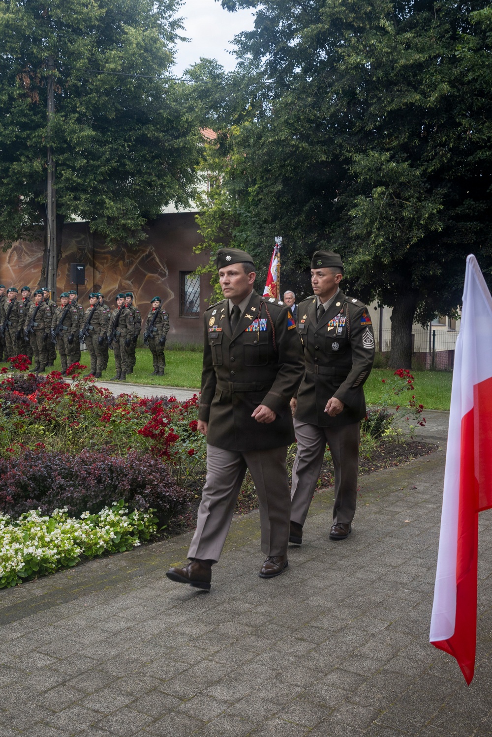 U.S. Army Soldiers participate at a memorial ceremony in Poland