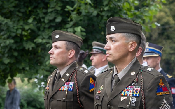 U.S. Army Soldiers participate at a memorial ceremony in Poland