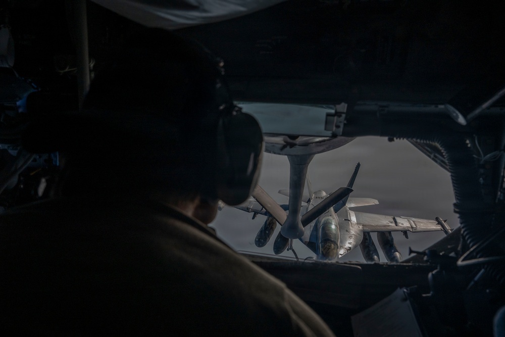 KC-135 refuels U.S. Navy fighters in the CENTCOM area of responsibility