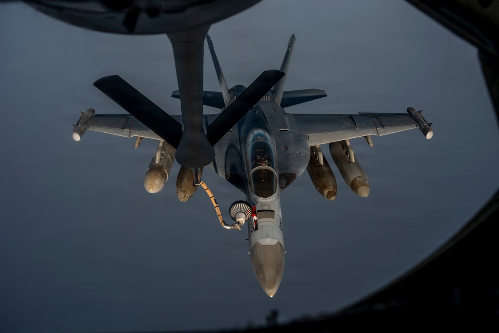 KC-135 refuels U.S. Navy fighters in the CENTCOM area of responsibility