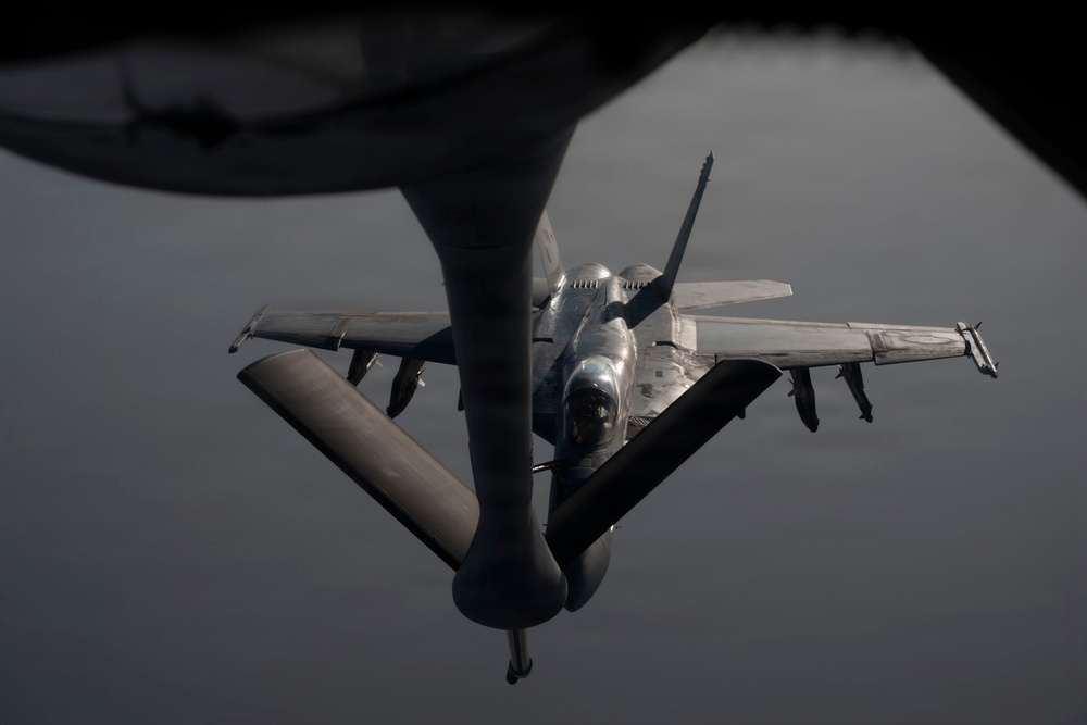 KC-135 refuels U.S. Navy fighters in the CENTCOM area of responsibility