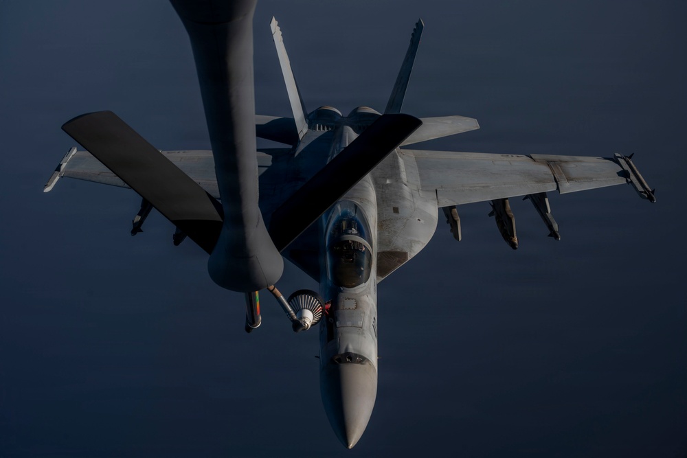 KC-135 refuels U.S. Navy fighters in the CENTCOM area of responsibility