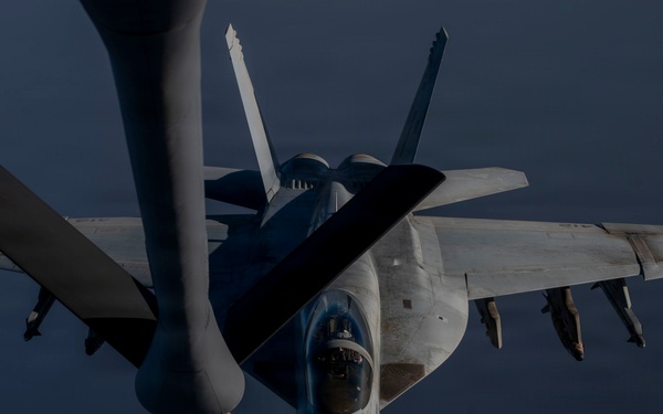 KC-135 refuels U.S. Navy fighters in the CENTCOM area of responsibility