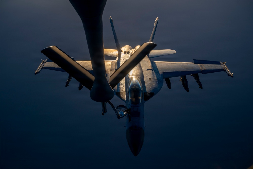 KC-135 refuels U.S. Navy fighters in the CENTCOM area of responsibility