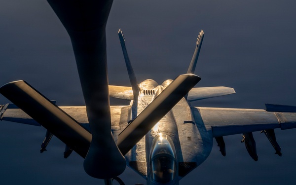KC-135 refuels U.S. Navy fighters in the CENTCOM area of responsibility