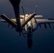 KC-135 refuels U.S. Navy fighters in the CENTCOM area of responsibility