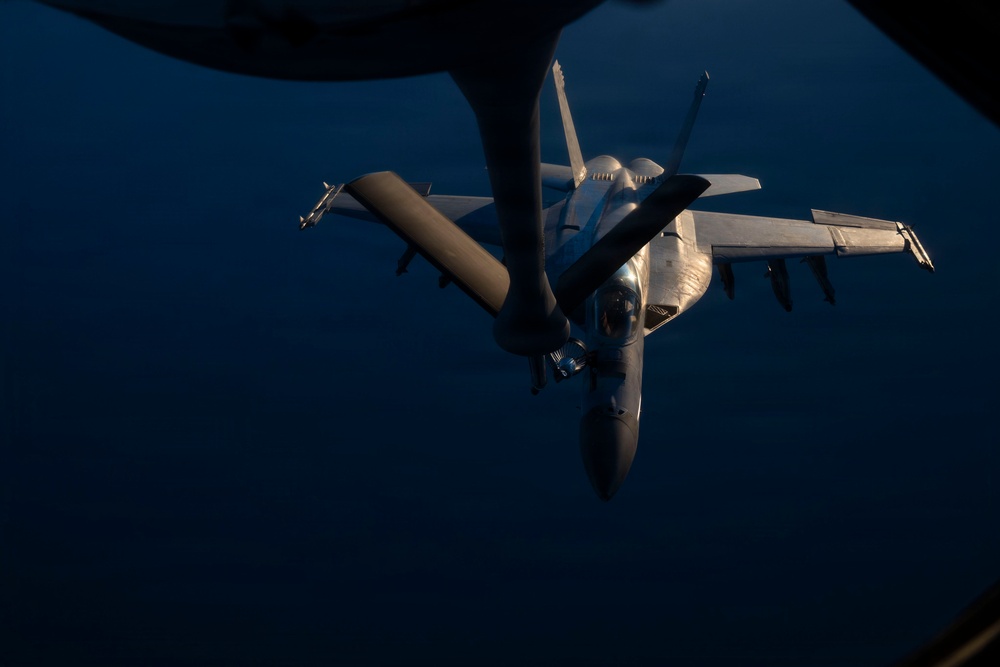 KC-135 refuels U.S. Navy fighters in the CENTCOM area of responsibility