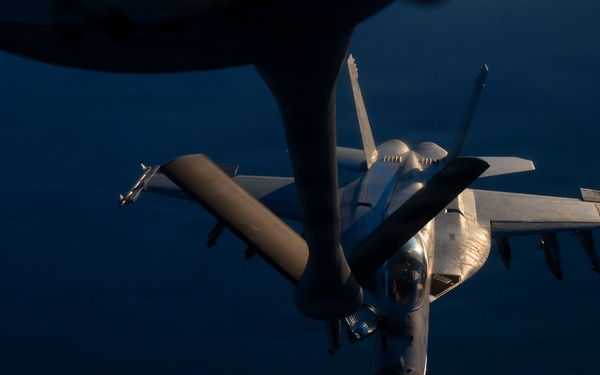 KC-135 refuels U.S. Navy fighters in the CENTCOM area of responsibility