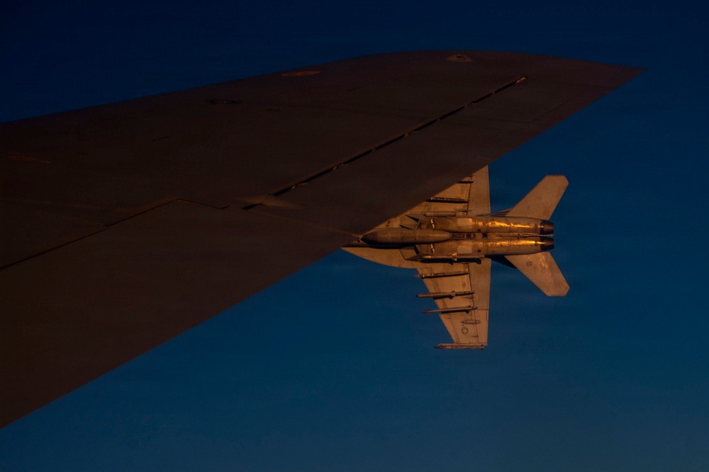 KC-135 refuels U.S. Navy fighters in the CENTCOM area of responsibility
