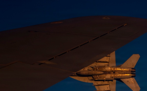 KC-135 refuels U.S. Navy fighters in the CENTCOM area of responsibility