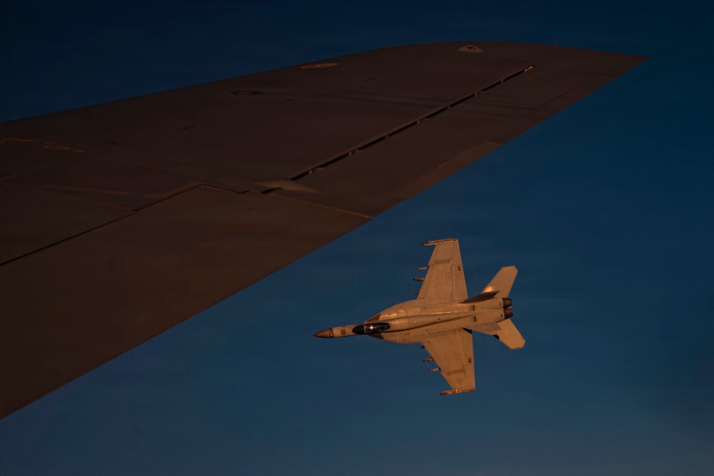 KC-135 refuels U.S. Navy fighters in the CENTCOM area of responsibility