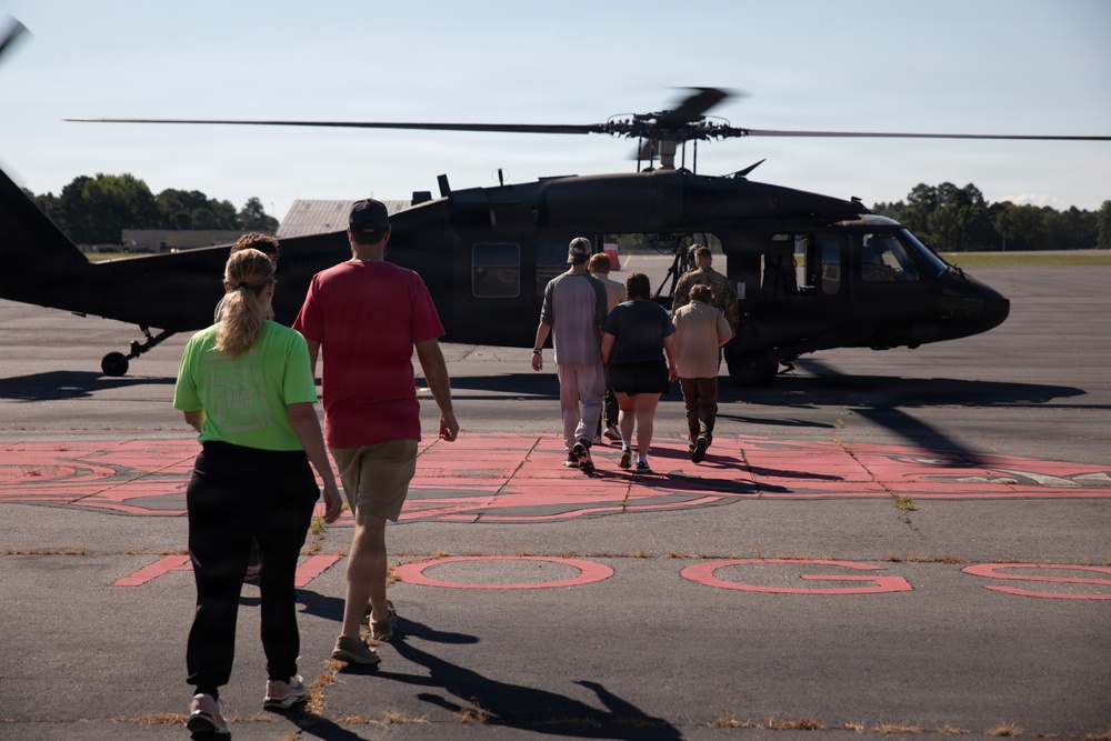 Boy Scouts of America (Cabot, AR) participate in Equipment Preparations and Flights on UH-60 Blackhawks
