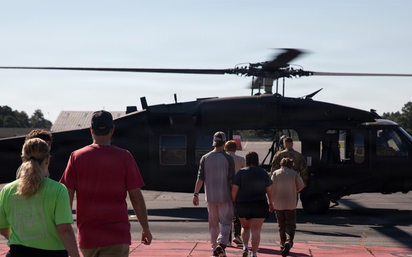 Boy Scouts of America (Cabot, AR) participate in Equipment Preparations and Flights on UH-60 Blackhawks