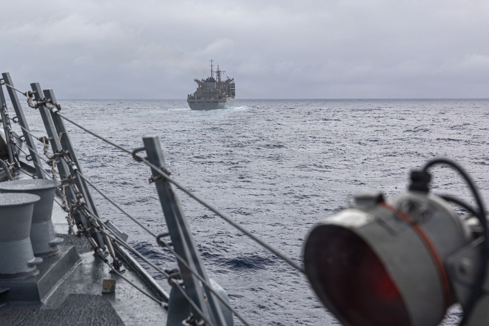 USS Mustin conducts replenishment-at-sea with USNS Arctic