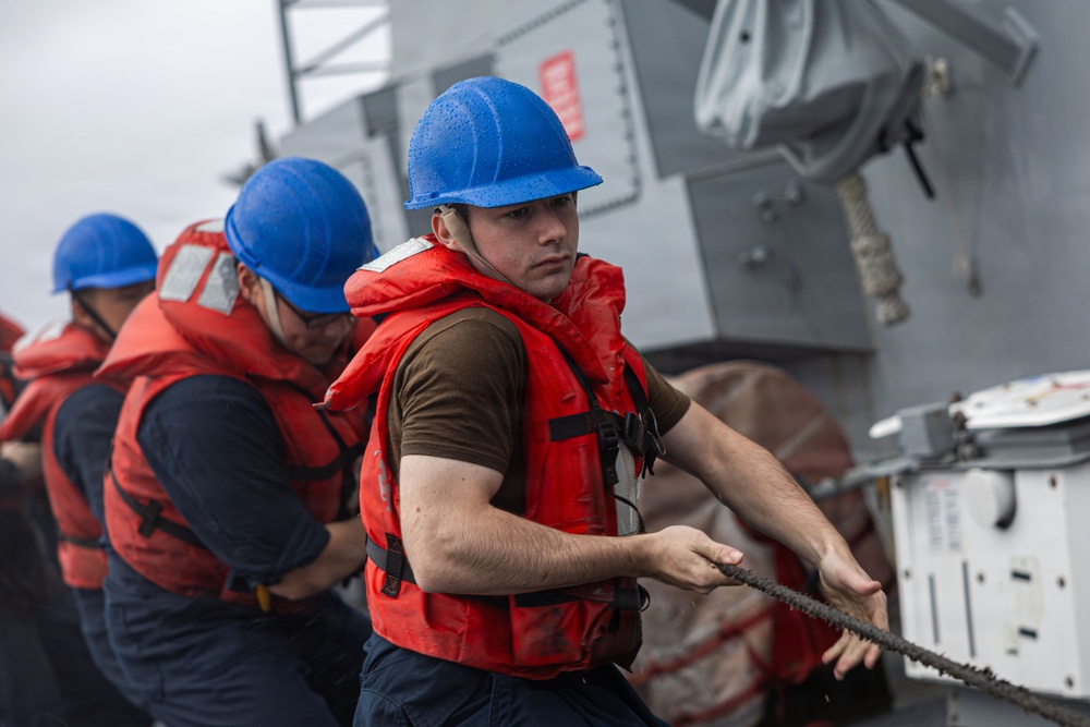 USS Mustin conducts replenishment-at-sea with USNS Arctic