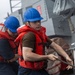 USS Mustin conducts replenishment-at-sea with USNS Arctic