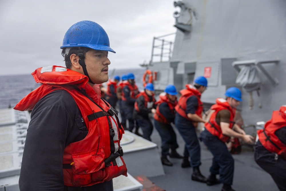 USS Mustin conducts replenishment-at-sea with USNS Arctic