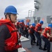 USS Mustin conducts replenishment-at-sea with USNS Arctic
