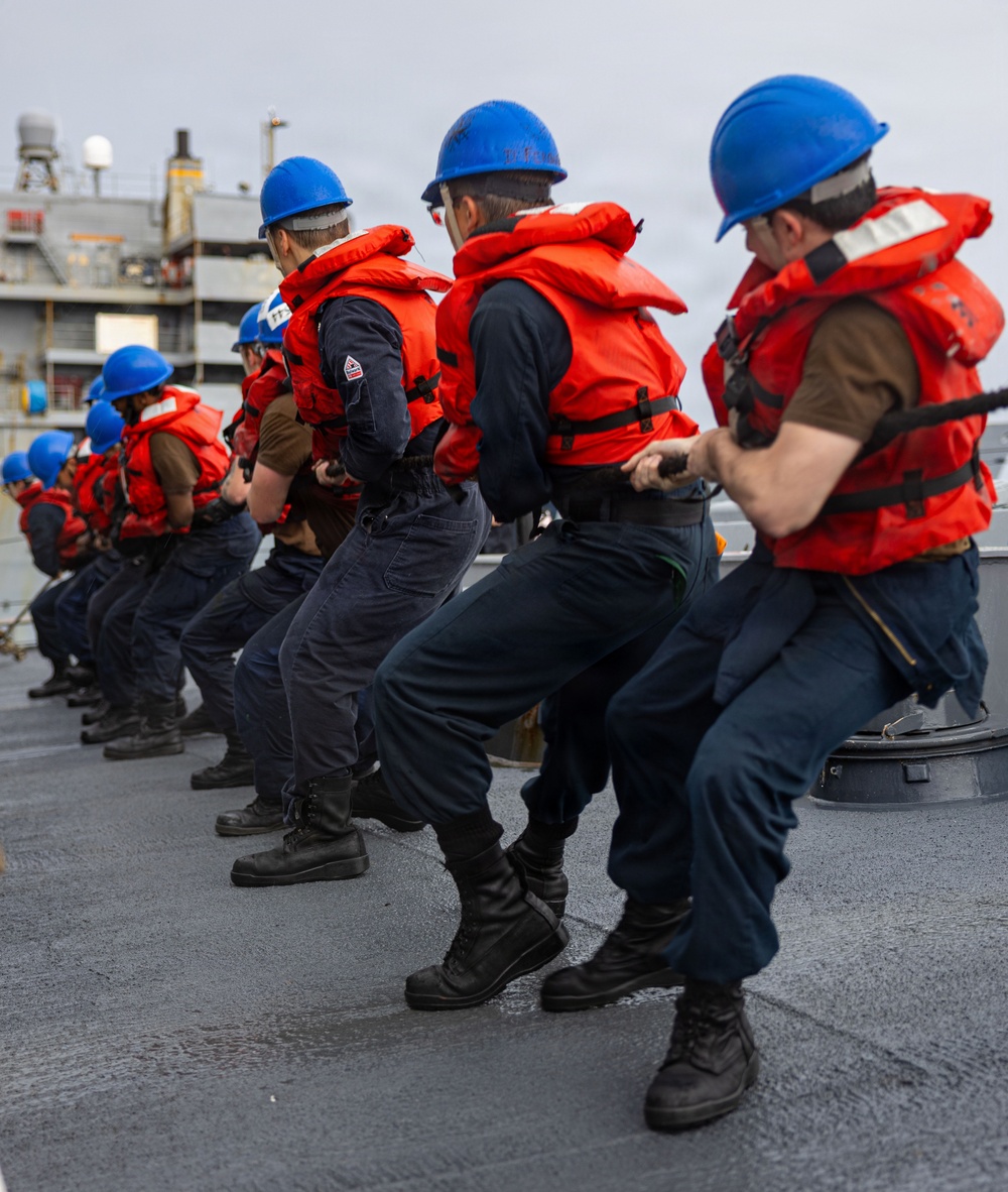 USS Mustin conducts replenishment-at-sea with USNS Arctic