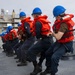 USS Mustin conducts replenishment-at-sea with USNS Arctic