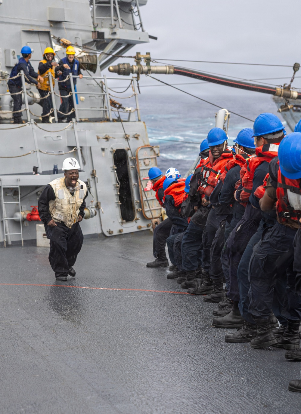 USS Mustin conducts replenishment-at-sea with USNS Arctic