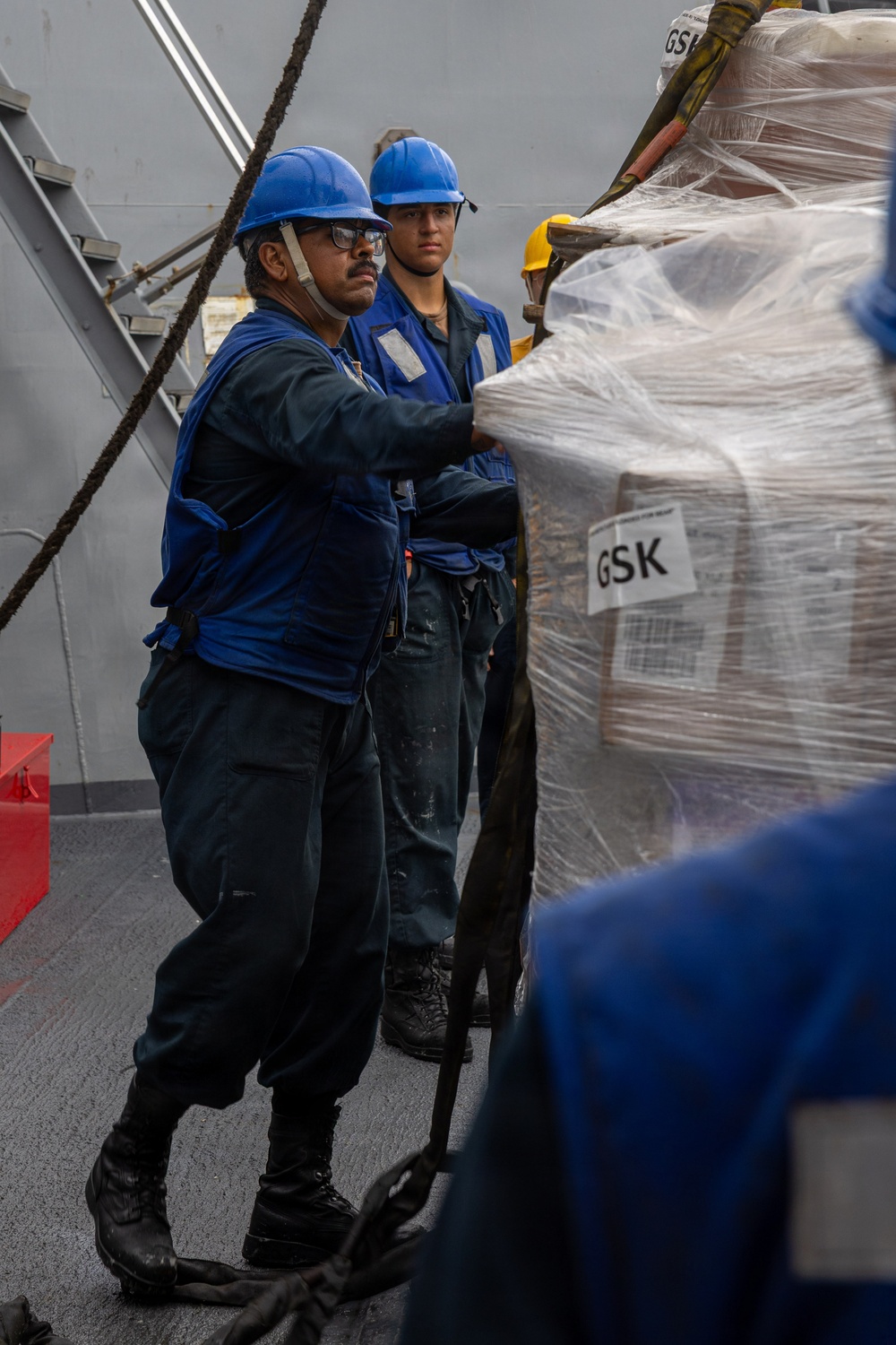 USS Mustin conducts replenishment-at-sea with USNS Arctic
