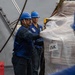USS Mustin conducts replenishment-at-sea with USNS Arctic