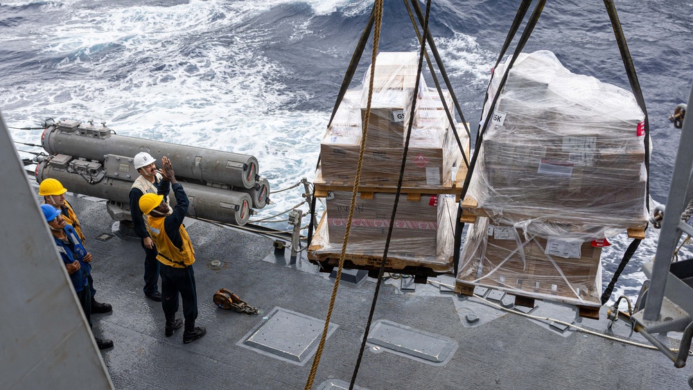 USS Mustin conducts replenishment-at-sea with USNS Arctic