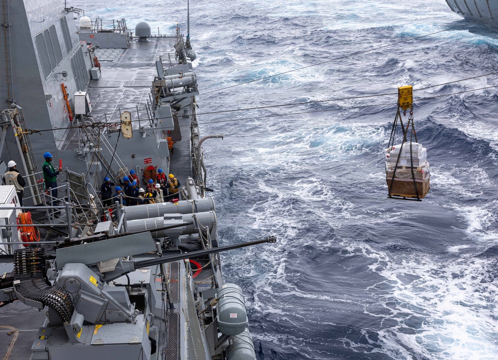 USS Mustin conducts replenishment-at-sea with USNS Arctic