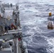 USS Mustin conducts replenishment-at-sea with USNS Arctic