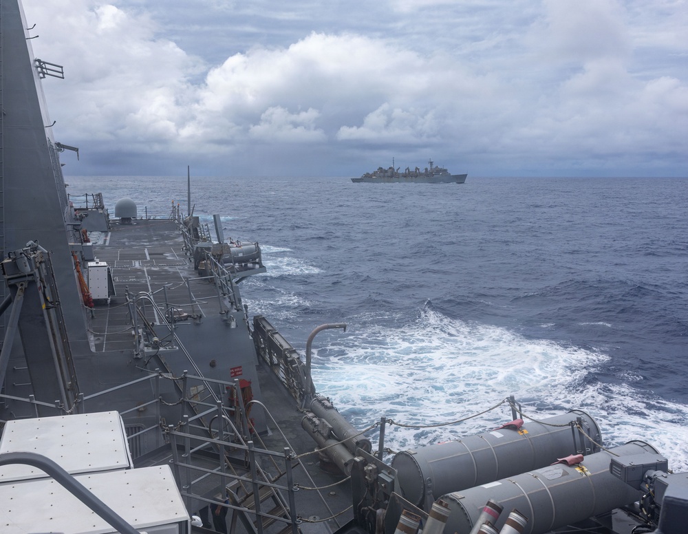 USS Mustin conducts replenishment-at-sea with USNS Arctic