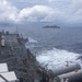 USS Mustin conducts replenishment-at-sea with USNS Arctic