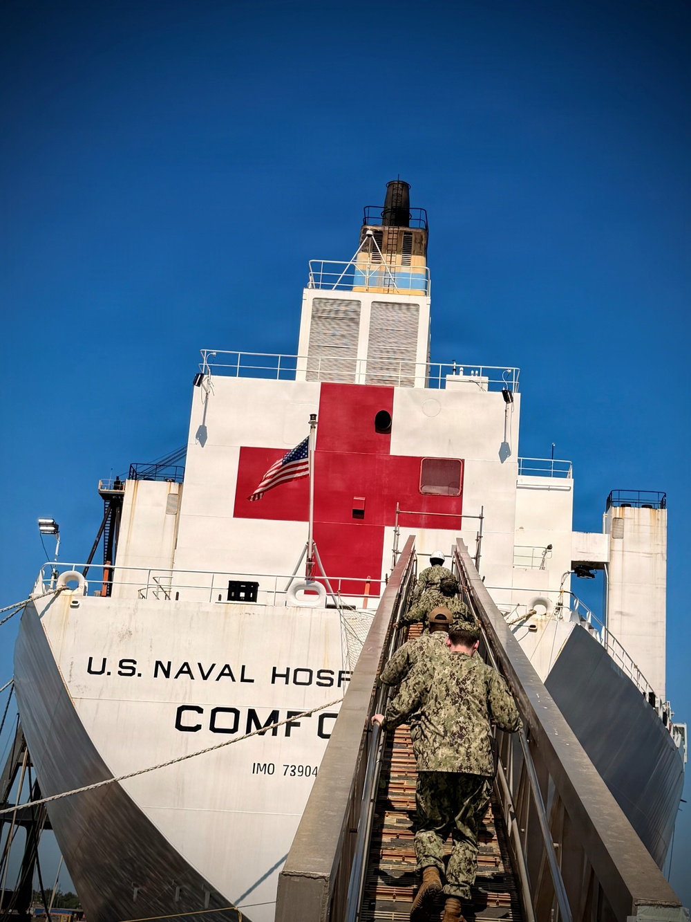 Sailors Board USNS Comfort Hospital Ship