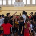 Youth basketball camp led by Christain Taylor, a professional international basketball player, at the Semper Fit base gym aboard Marine Corps Logistics Base Barstow, California, August 1.