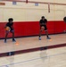 Youth basketball camp led by Christain Taylor, a professional international basketball player, at the Semper Fit base gym aboard Marine Corps Logistics Base Barstow, California, August 1.