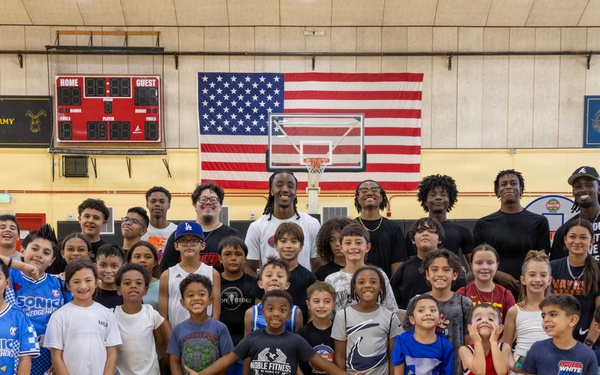 Youth basketball camp led by Christain Taylor, a professional international basketball player, at the Semper Fit base gym aboard Marine Corps Logistics Base Barstow, California, August 1.