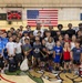 Youth basketball camp led by Christain Taylor, a professional international basketball player, at the Semper Fit base gym aboard Marine Corps Logistics Base Barstow, California, August 1.