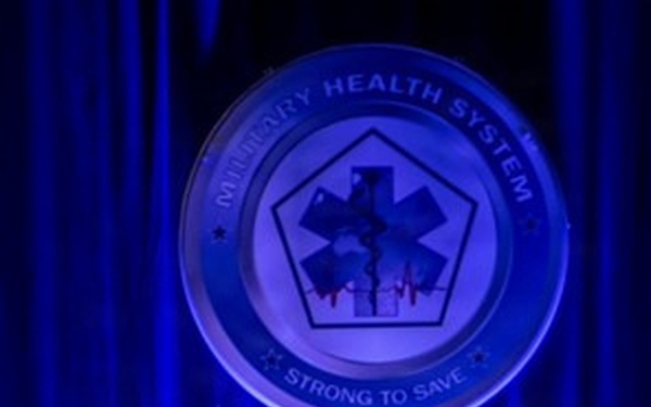 Top military health official kicks off annual symposium, encourages collaboration to ‘transform research into better care for those who serve’