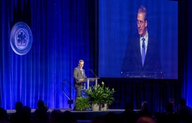 Top military health official kicks off annual symposium, encourages collaboration to ‘transform research into better care for those who serve’