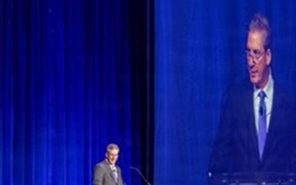 Top military health official kicks off annual symposium, encourages collaboration to ‘transform research into better care for those who serve’
