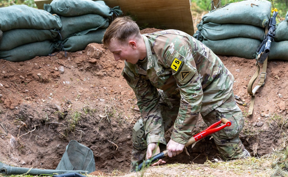 U.S. Army Europe and Africa Best Squads Construct Defensive Fighting Positions