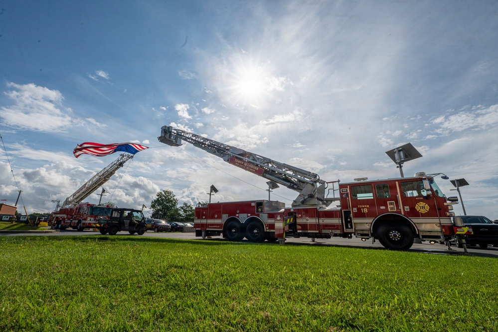 Local Fire Companies Hoist Giant American flag for Delaware Guard Family Day