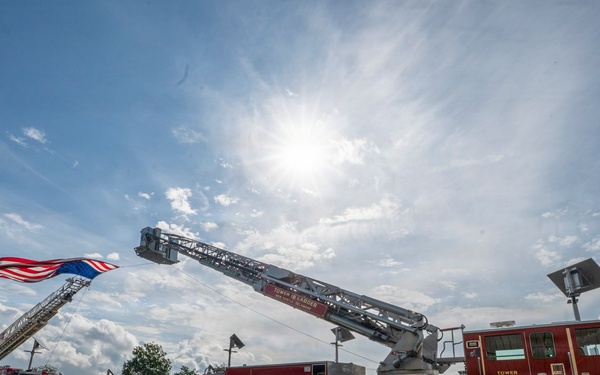 Local Fire Companies Hoist Giant American flag for Delaware Guard Family Day