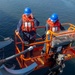 Ronald Reagan Sailors Conduct Life Raft Onload