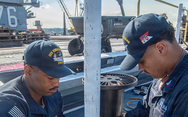 Ronald Reagan Sailors Conduct Life Raft Onload