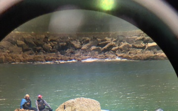 U.S. Coast Guard rescues 2 people stranded on rocks in the Coquille River