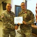 U.S. Army Lt. Col. Charles Baxter, Mississippi National Guard, receives the Mississippi Magnolia Cross