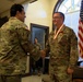 U.S. Army Lt. Col. Charles Baxter, Mississippi National Guard, receives the Bronze Order of Mercury award